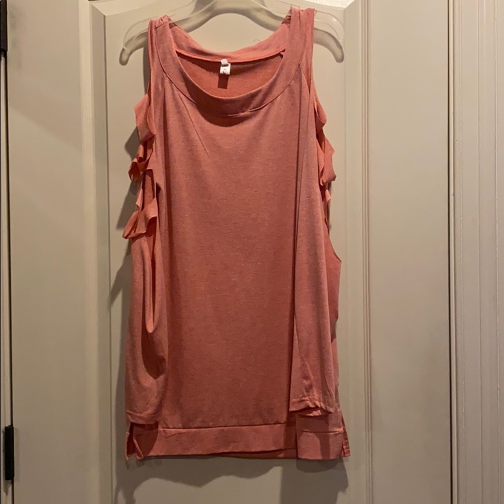 pink shirt with slits in arm